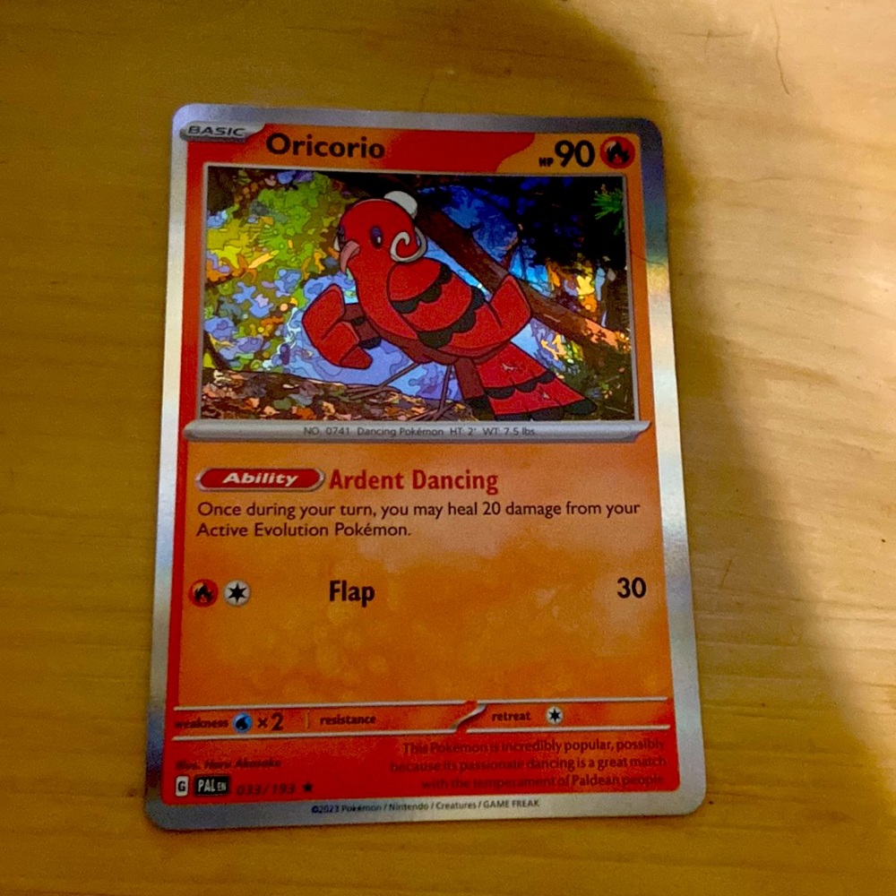 Pokémon card red, orange, and black white